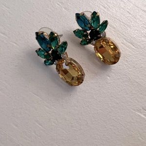 Unknown brand. Beautiful, lighter weight pineapple earrings.